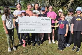 9th Milngavie Guides with the John Lewis donation