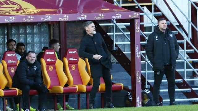 'Well boss Graham Alexander surveys the action