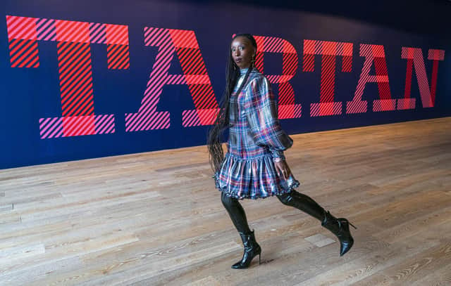 Model Eunice Olumide wears a tartan designed by Charles Jeffery during a preview for the forthcoming Tartan exhibition at V&A Dundee. Picture: Jane Barlow/PA Wire