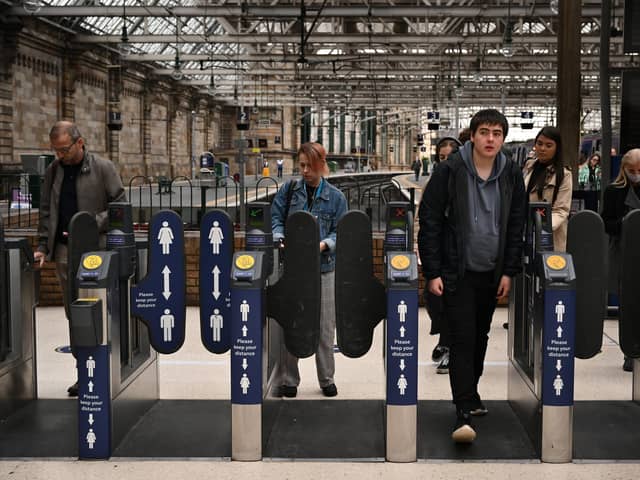 Members of the public pass through Central Station on June 21, 2022 in Glasgow.. The biggest rail strikes in 30 years started on Monday night with trains cancelled across the UK for much of the week. (Photo by Jeff J Mitchell/Getty Images)