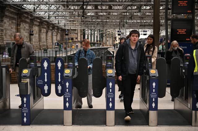 Members of the public pass through Central Station on June 21, 2022 in Glasgow.. The biggest rail strikes in 30 years started on Monday night with trains cancelled across the UK for much of the week. (Photo by Jeff J Mitchell/Getty Images)