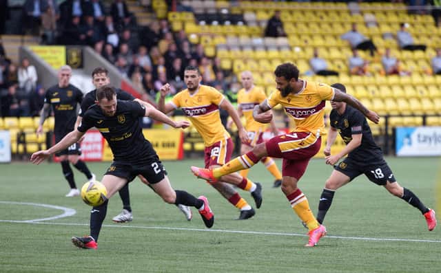 'Well's Kaiyne Woolery tries to beat Nicky Devlin