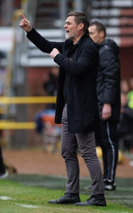 Motherwell mananger Graham Alexander suffered defeat at Tannadice (Pic by Ian McFadyen)