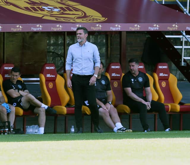 Motherwell boss Graham Alexander observing proceedings at the weekend