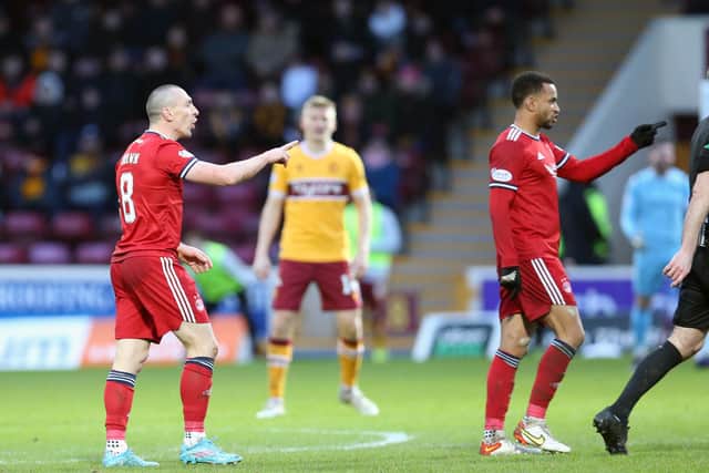 Aberdeen's Scott Brown contests a decision