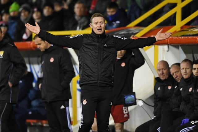 Aberdeen interim head coach Barry Robson on the sidelines.