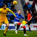 Ciaron Brown (left) battling against Rangers’ Ryan Kent in a game at Ibrox. Picture: SNS