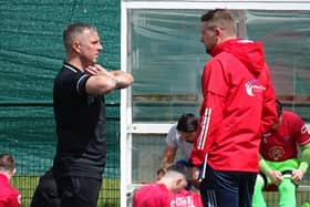 Neil Schoneville (right) is pictured talking to ex-Bellshill Athletic manager Derek Wilson (Pic by David Grimason)