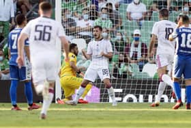 Celtic's Croatian midfielder Josip Juranovic (C) celebrates after scoring during the UEFA Europa League football match between Real Betis and Celtic FC at the Benito Villamarin stadium in Seville on September 16, 2021. (Photo by JORGE GUERRERO/AFP via Getty Images)