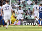 Celtic's Croatian midfielder Josip Juranovic (C) celebrates after scoring during the UEFA Europa League football match between Real Betis and Celtic FC at the Benito Villamarin stadium in Seville on September 16, 2021. (Photo by JORGE GUERRERO/AFP via Getty Images)