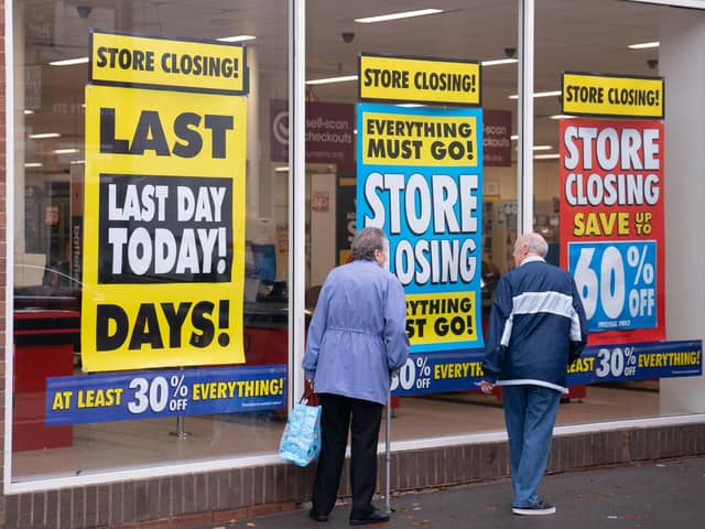 Customers walk past Wilko in Brownhills near Walsall, one of the first Wilko stores to close down as the dramatic collapse of the high street chain takes shape. The historic retailer will shut 24 stores across the UK in the first phase of closures, with hundreds of workers at the shops set for redundancy. Picture date: Tuesday September 12, 2023.