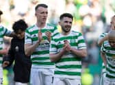 Celtic's David Turnbull (left) and Greg Taylor applaud the fans after the 4-0 win over Ross County. (Photo by Alan Harvey / SNS Group)