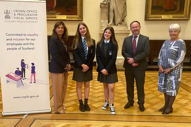 Winners of the competition, Rose Usher and Mairin Campbell-Thow, with the Lord Advocate, Crown Agent David Harvie and Lesslie Young, chief executive of Epilepsy Scotland. Pic: Crown Office