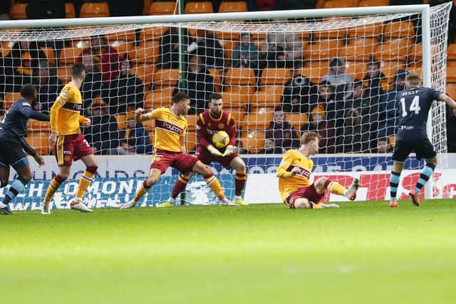 Motherwell keeper Liam Kelly gathers a shot