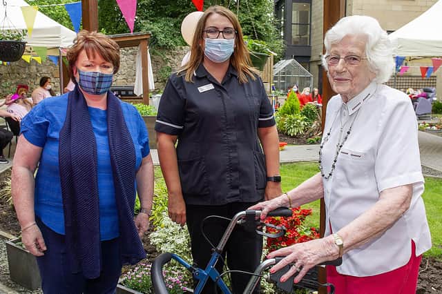 Rona Mackay MSP joins Antonine House's care home manager Amanda King and 95 year old resident May Stevenson at the fun day