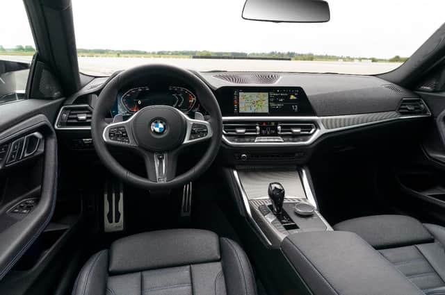 Sports seats and BMW's latest iDrive media system are standard