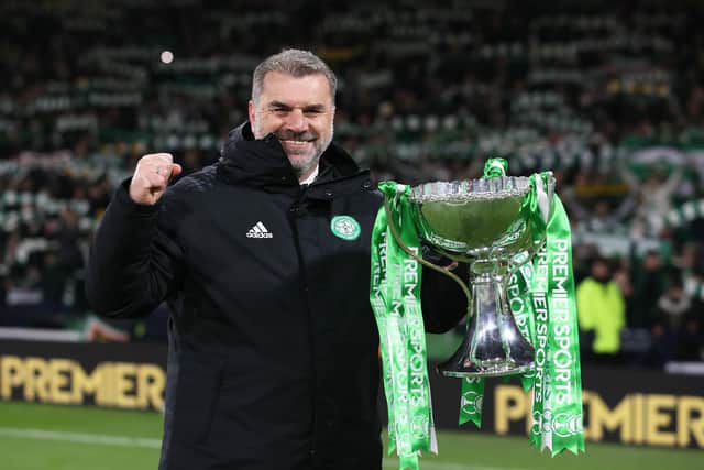 Celtic manager Ange Postecoglou celebrates with the Premier Sports Cup trophy after the 2-1 win over Hibs at Hampden in December. (Photo by Craig Williamson / SNS Group)