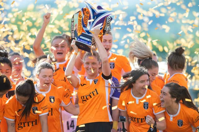 Leanne Ross of Glasgow City lifts the SWPL title. (Photo by Mark Scates / SNS Group)