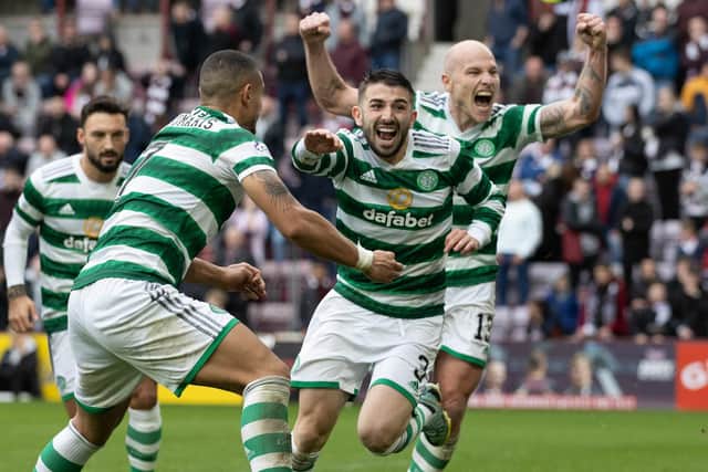 Celtic's Greg Taylor celebrates making it 4-3 in the win over Hearts. (Photo by Craig Williamson / SNS Group)