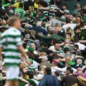 Thousands of Celtic fans often celebrate a goal or a victory by linking arms and facing away from the park before taking part in a mass huddle.