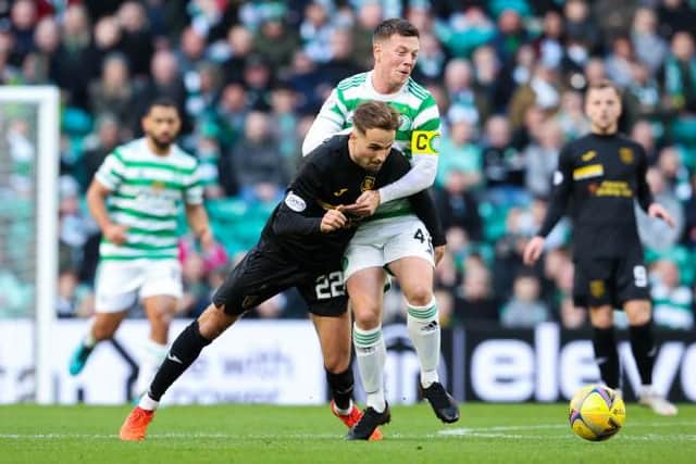 Livingston's Andrew Shinnie (L) and Celtic's Callum McGregor during a Cinch Premiership match between Celtic and Livingston, on October 30, in Glasgow, Scotland. (Photo by Alan Harvey / SNS Group)
