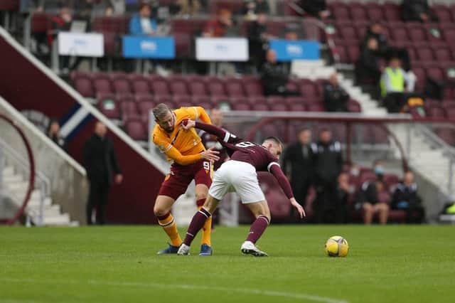 Kevin van Veen tries to win back possession for Steelmen