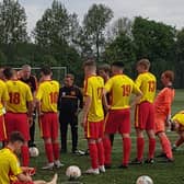 Rossvale players get a team talk before their friendly match against St Anthony's at Springburn Park (pic: Rossvale FC)