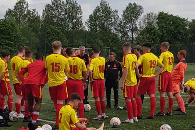 Rossvale players get a team talk before their friendly match against St Anthony's at Springburn Park (pic: Rossvale FC)