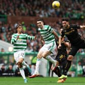 Ricki Lamie battles for the ball with Tom Rogic