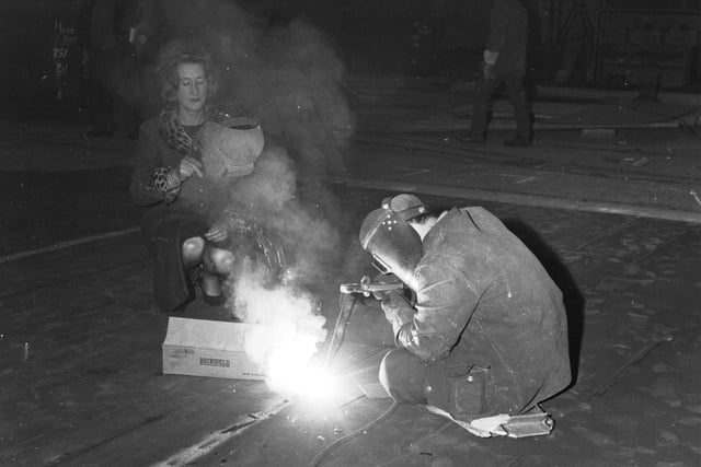 SNP MP Winnie Ewing watches a welder at work when she visits Fairfield's shipyard at Govan in January 1968