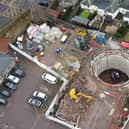 Scottish Water has completed its £2.5 million project to help drain the rain and protect the centre of Lanark, which also saw a training exercise with the SFRS.
