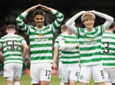 Kyogo Furuhashi (right) celebrates with Jota after scoring Celtic's opener in the win over Ross County. (Photo by Alan Harvey / SNS Group)
