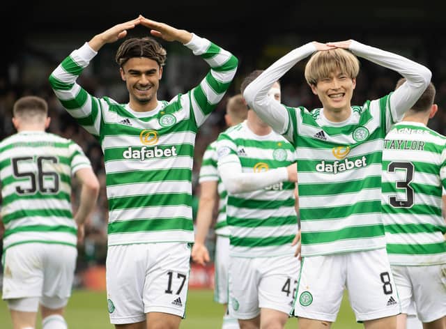 Kyogo Furuhashi (right) celebrates with Jota after scoring Celtic's opener in the win over Ross County. (Photo by Alan Harvey / SNS Group)
