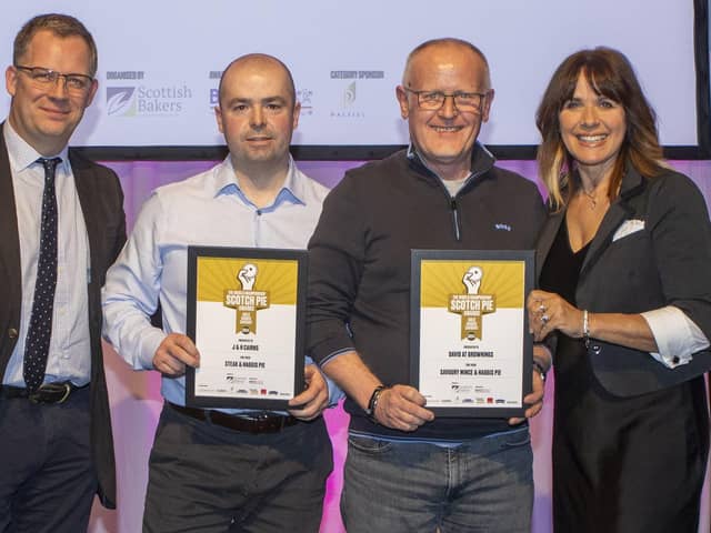 Father and son Jamie and Jim Cairns were delighted to pick up their gold award from ceremony presenter Carol Smillie.