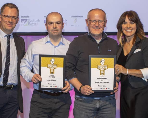 Father and son Jamie and Jim Cairns were delighted to pick up their gold award from ceremony presenter Carol Smillie.