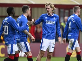 Todd Cantwell celebrates with Fashion Sakala after putting Rangers 3-2 ahead at Motherwell. (Photo by Rob Casey / SNS Group)