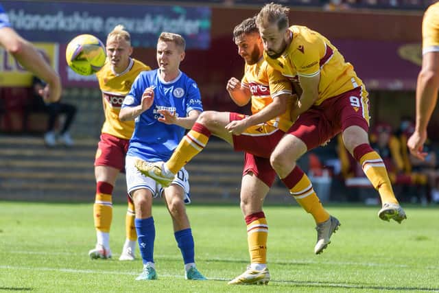 Motherwell’s Steven Lawless and Kevin Van Veen challenging for the ball on Saturday