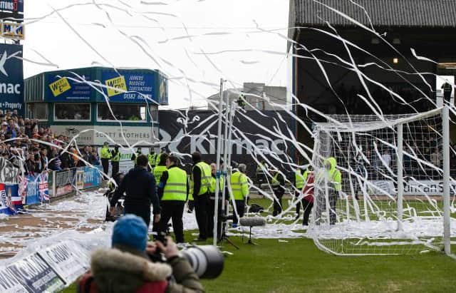 Play was held up three times at Dens Park as Rangers supporters hurled toilet rolls and tennis balls into the goalmouth at the start of each half. (Photo by Alan Harvey / SNS Group)