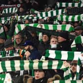 Celtic fans. (Photo by ANDY BUCHANAN/AFP via Getty Images)