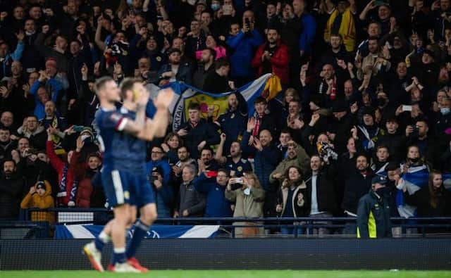 Scotland players applaud the fans at full time during a FIFA World Cup Qualifier between Scotland and Denmark. Future games will be streamed on a new service from 2024. (Photo by Craig Foy / SNS Group)