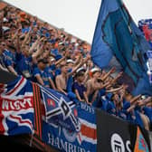 Rangers supporters cheer from the stands prior to the UEFA Europa League final football match between Eintracht Frankfurt and Glasgow Rangers at the Ramon Sanchez Pizjuan stadium in Seville on May 18, 2022. (Photo by JORGE GUERRERO / AFP) (Photo by JORGE GUERRERO/AFP via Getty Images)