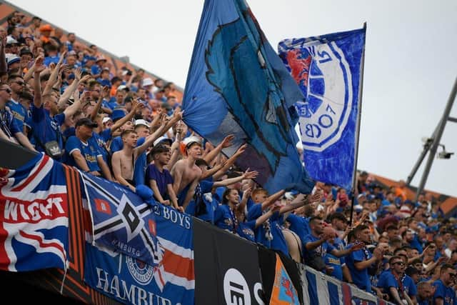 Rangers supporters cheer from the stands prior to the UEFA Europa League final football match between Eintracht Frankfurt and Glasgow Rangers at the Ramon Sanchez Pizjuan stadium in Seville on May 18, 2022. (Photo by JORGE GUERRERO / AFP) (Photo by JORGE GUERRERO/AFP via Getty Images)