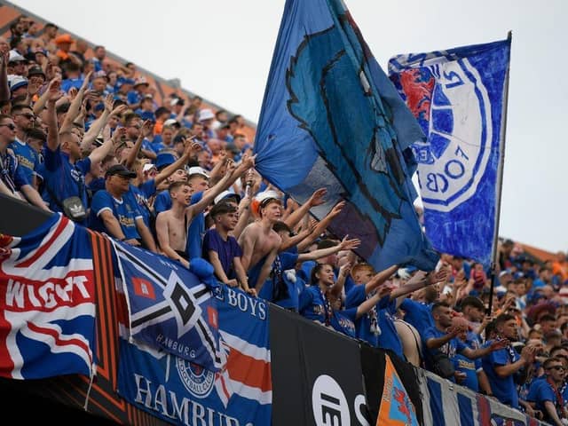 Rangers supporters cheer from the stands prior to the UEFA Europa League final football match between Eintracht Frankfurt and Glasgow Rangers at the Ramon Sanchez Pizjuan stadium in Seville on May 18, 2022. (Photo by JORGE GUERRERO / AFP) (Photo by JORGE GUERRERO/AFP via Getty Images)