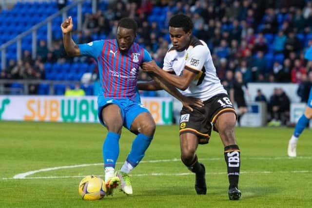 Inverness' Austin Samuels and Partick Thistle's Tunji Akinola. (Photo by Mark Scates / SNS Group)