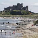 People enjoying the sunshine at Bamburgh Castle in Northumberland.
Pic: Owen Humphreys