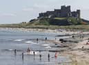 People enjoying the sunshine at Bamburgh Castle in Northumberland.
Pic: Owen Humphreys