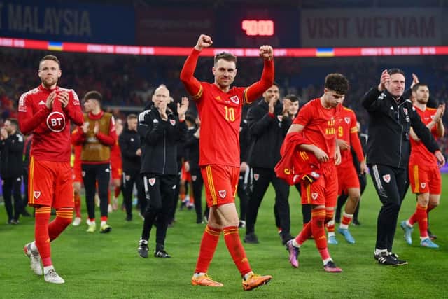 Aaron Ramsey celebrates Wales' qualification for the play-off final after defeating Austria in the semi-final. The midfielder is fit to play Celtic, if selected, says his national team manager. (Photo by Dan Mullan/Getty Images)