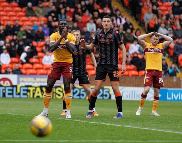 Bevis Mugabe and Connor Shields watch another chance go begging for Motherwell (Pic by Ian McFadyen)