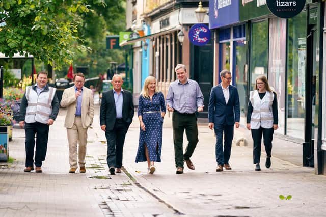 Minister for Community Wealth Tom Arthur met business leaders in Milngavie as he launched the Scottish Government's Scotland Loves Local Fund today (Monday, August 9 2021). He is pictured third from right walking through the centre of Milngavie with local business owners. The Scotland Loves Local Fund will be administered by Scotland's Towns Partnership. Picture: Jamie Simpson / Scotland's Towns Partnership