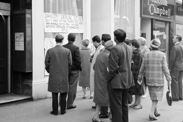 Nuclear Defence Plan - crowds gather round a shop window in Sauchiehall Street.